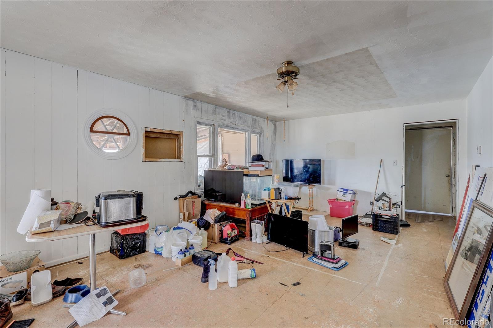952 Twin Lakes Road Walsenburg, CO 81089 - Photo 24 of 47 a view of a workspace with furniture and toys