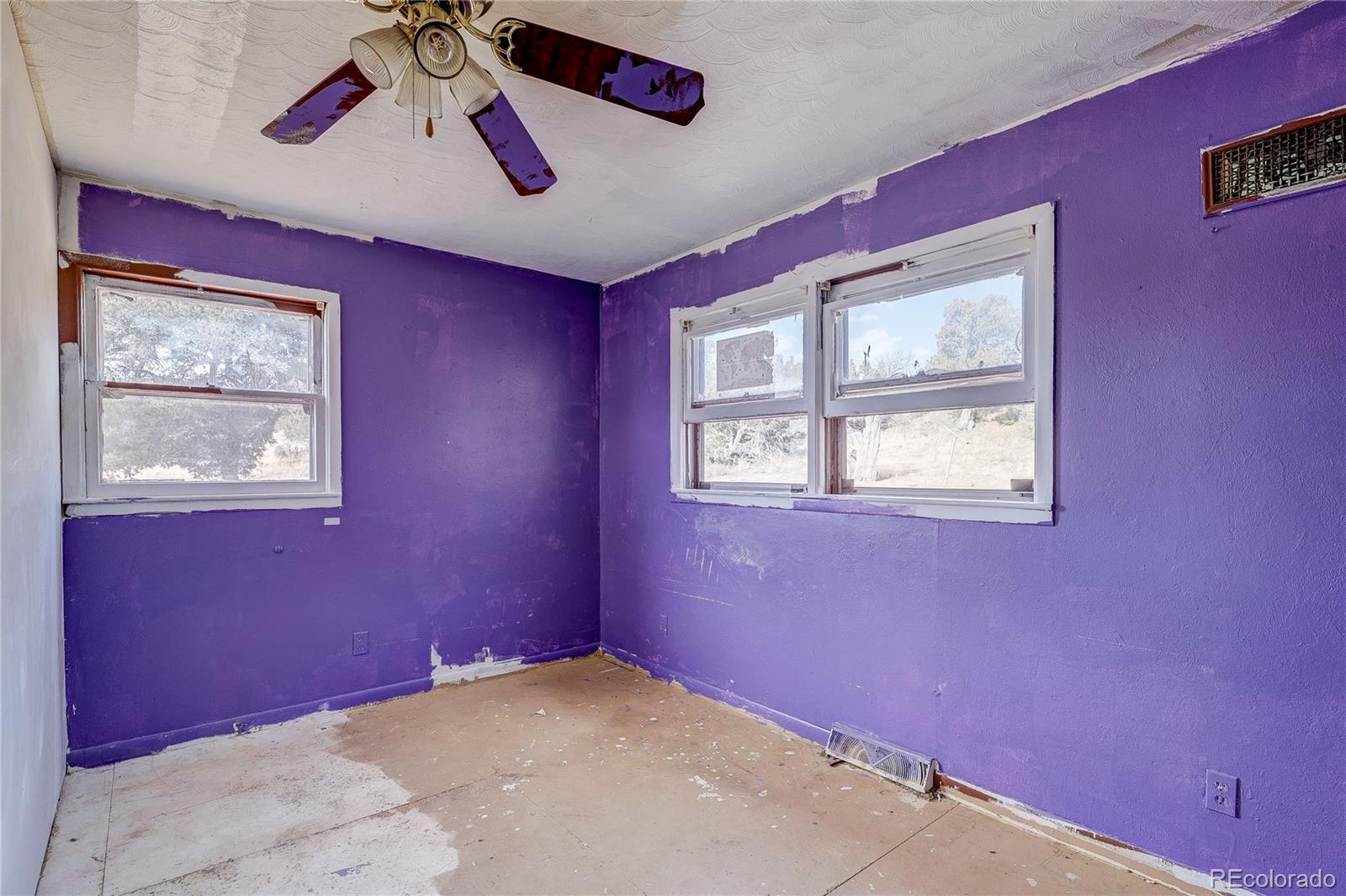 952 Twin Lakes Road Walsenburg, CO 81089 - Photo 26 of 47 a view of an empty room with a window