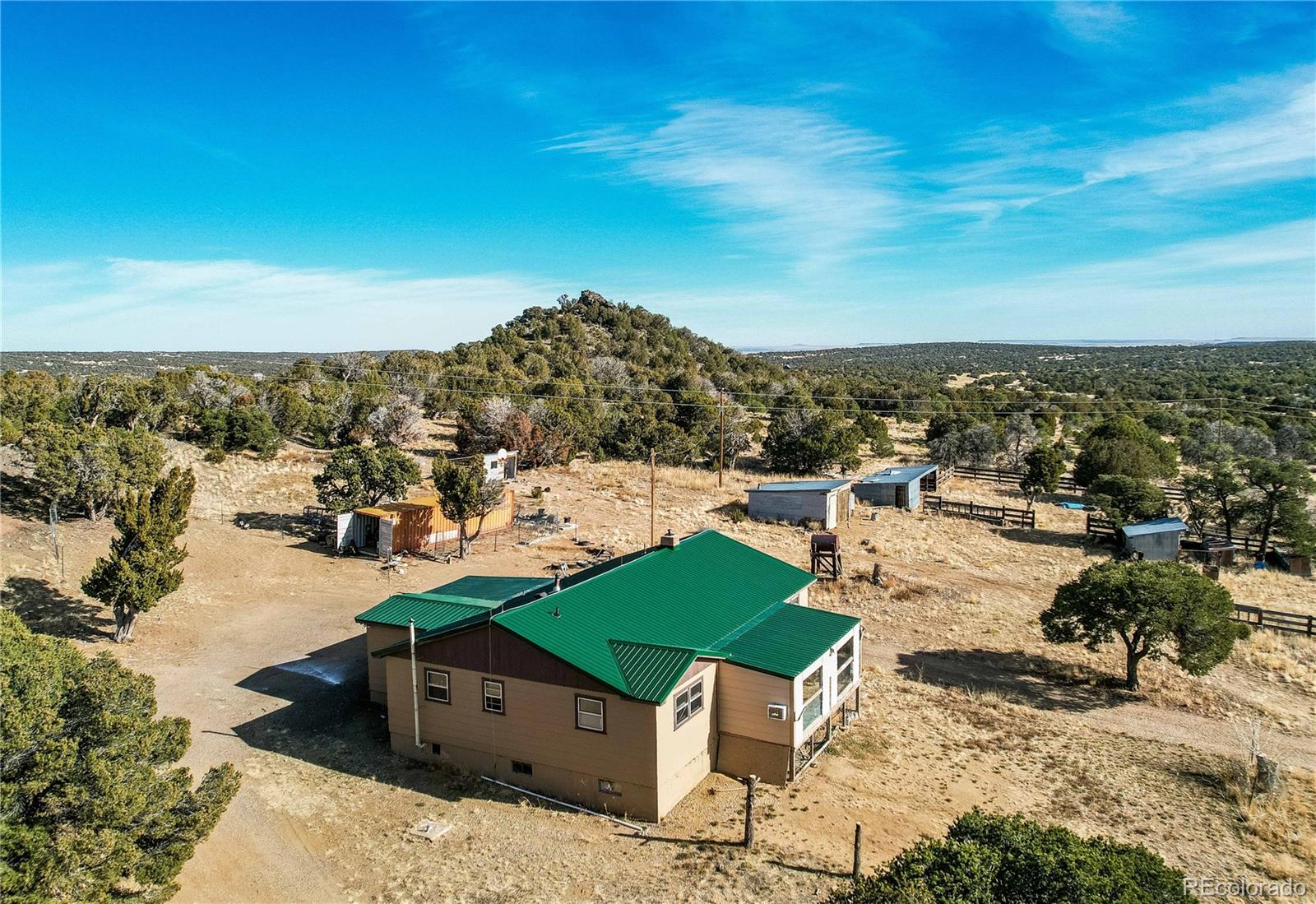 952 Twin Lakes Road Walsenburg, CO 81089 - Photo 3 of 47 a view of a terrace with a lake