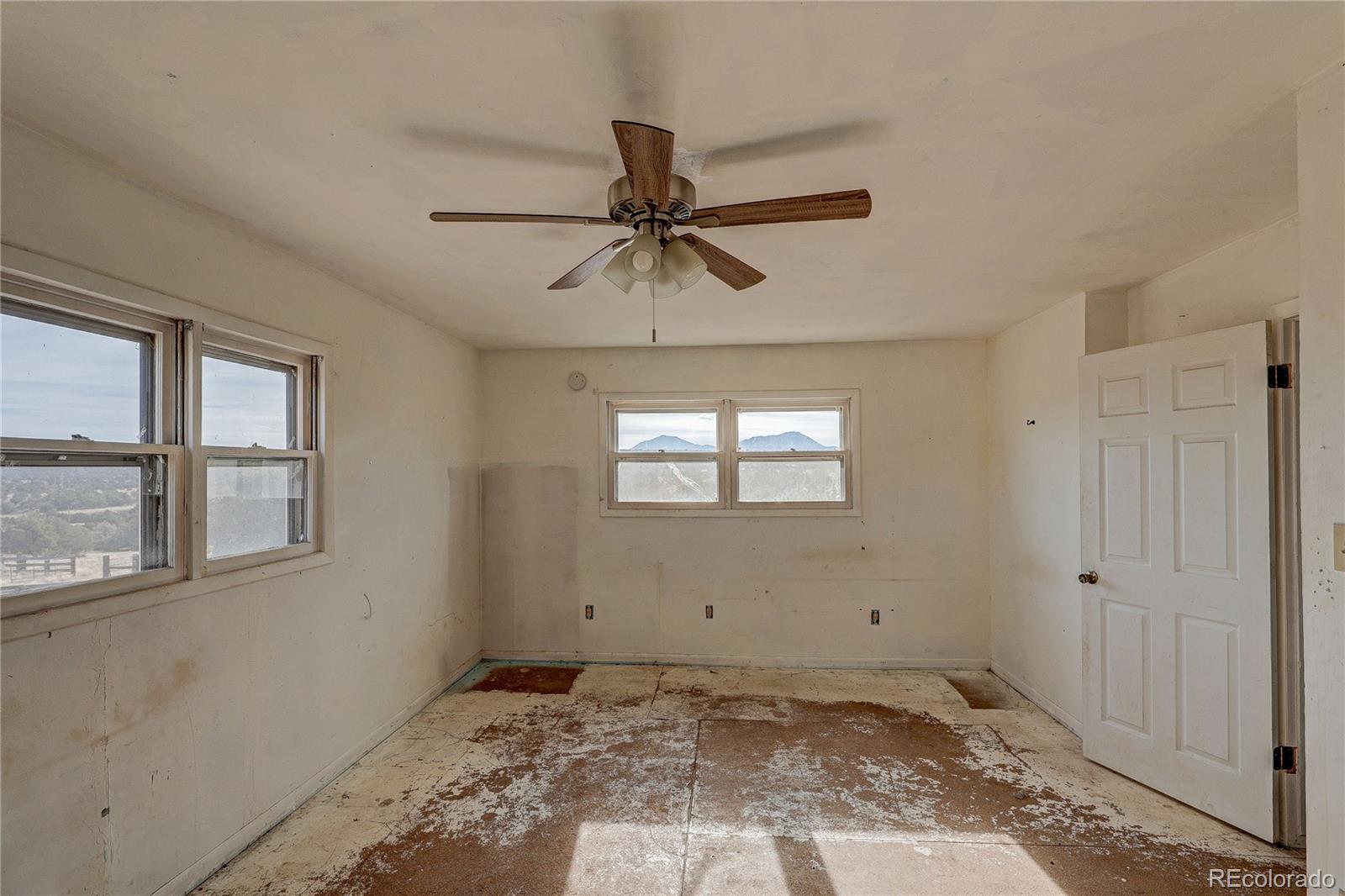 952 Twin Lakes Road Walsenburg, CO 81089 - Photo 34 of 47 a view of a window in an empty room