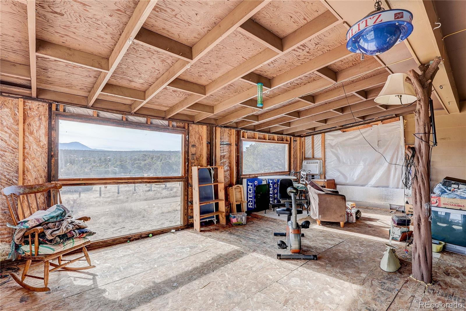952 Twin Lakes Road Walsenburg, CO 81089 - Photo 35 of 47 a view of a room with gym equipment