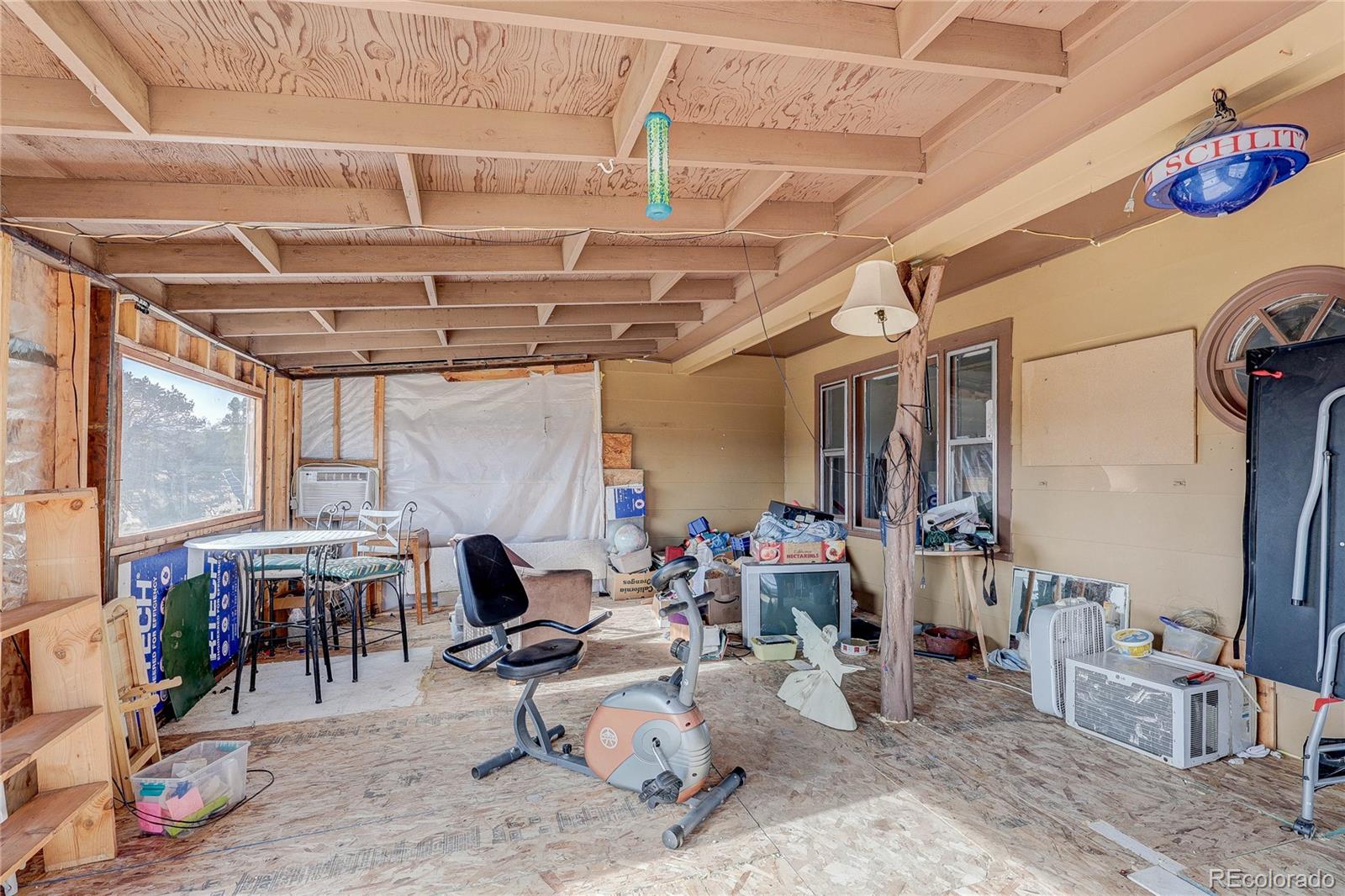 952 Twin Lakes Road Walsenburg, CO 81089 - Photo 36 of 47 a view of a storage room with wooden floor