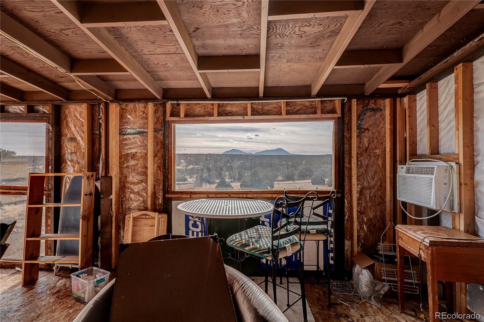 952 Twin Lakes Road Walsenburg, CO 81089 - Photo 37 of 47 a view of a room with gym equipment