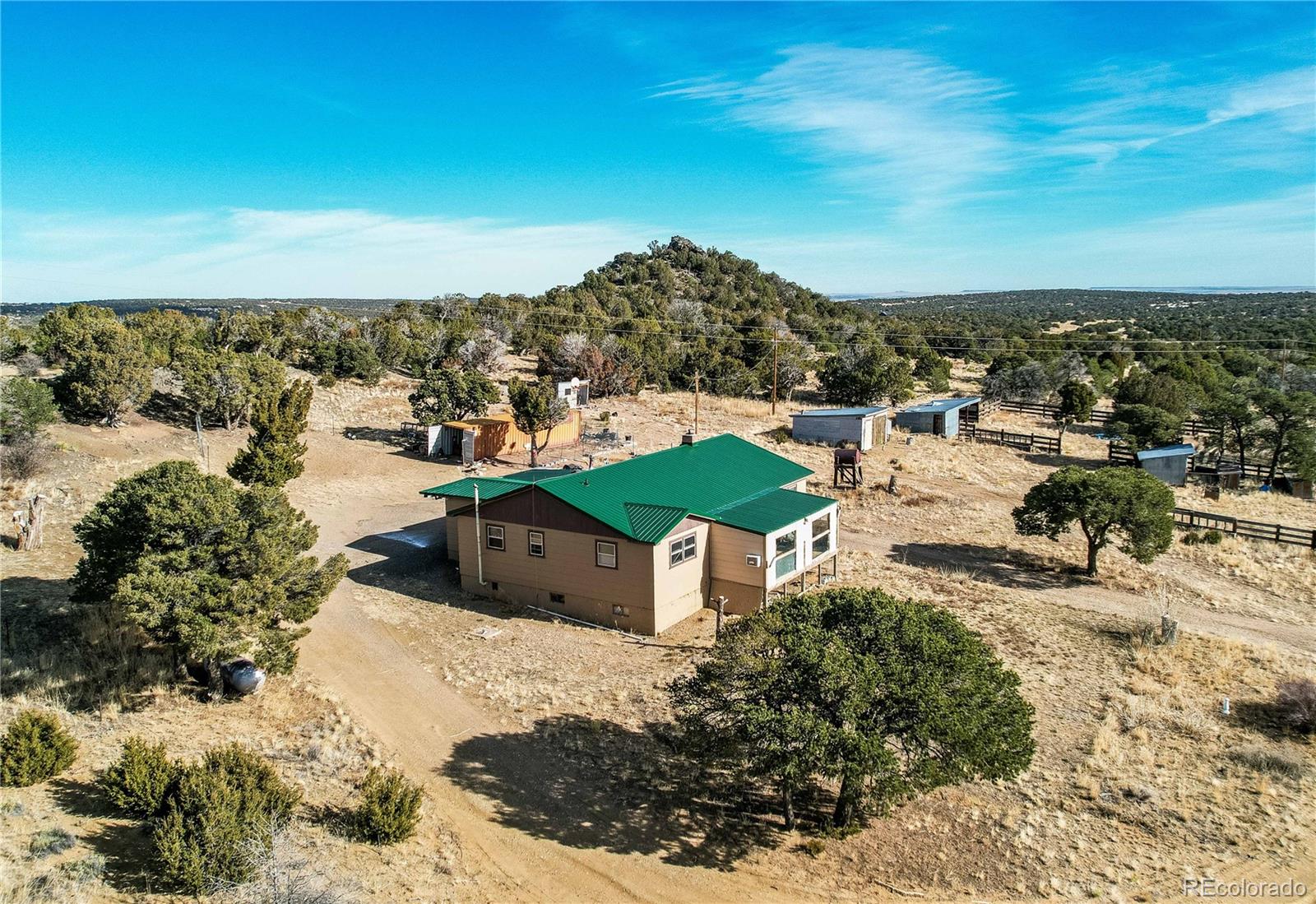 952 Twin Lakes Road Walsenburg, CO 81089 - Photo 9 of 47 a view of a city with lawn chairs