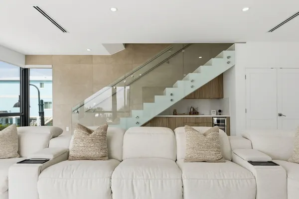 a living room with furniture and a table