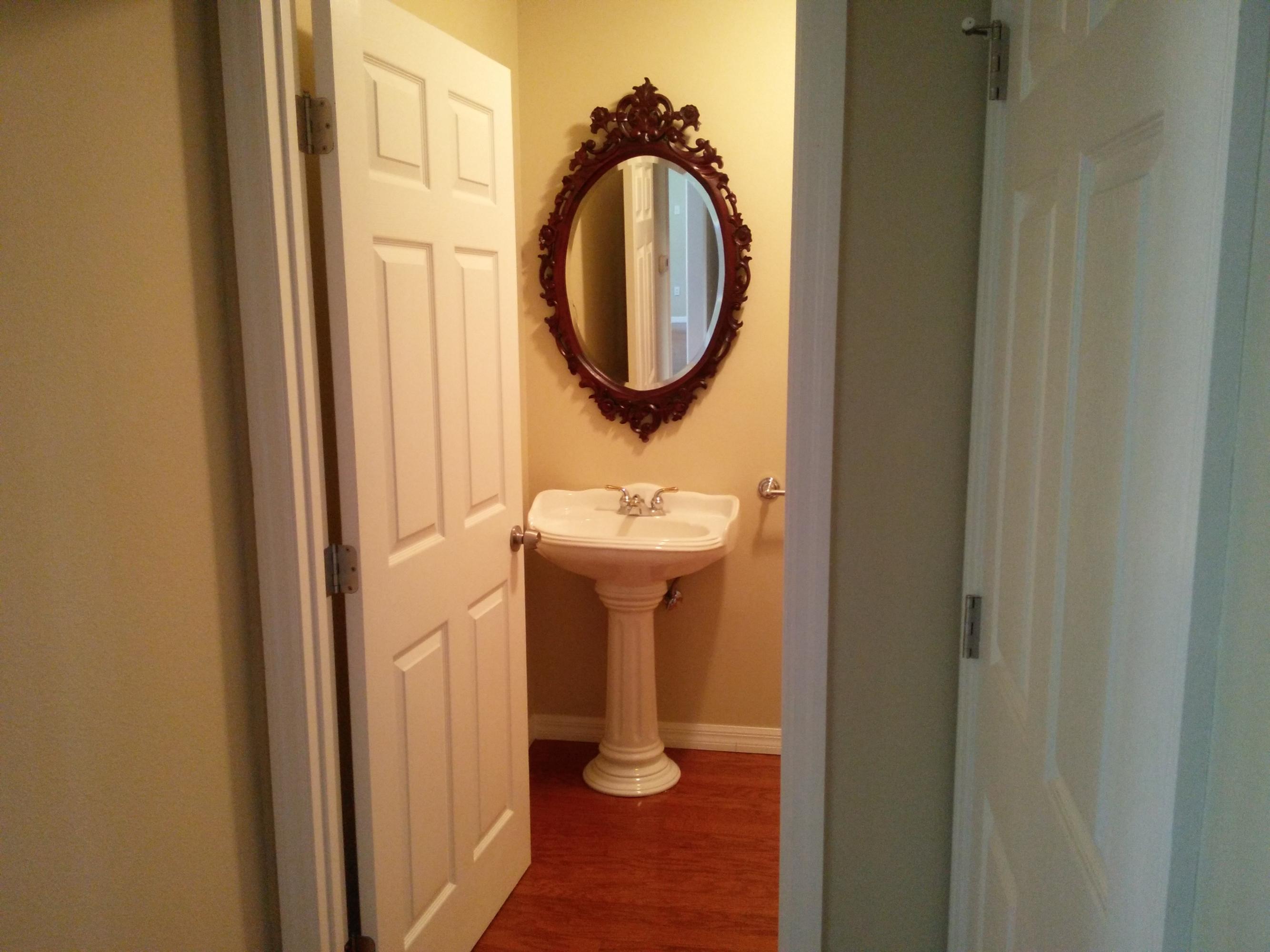 2376 Johnston Road Fort Pierce, FL 34951 - Photo 47 of 105 04_PowderRoom1