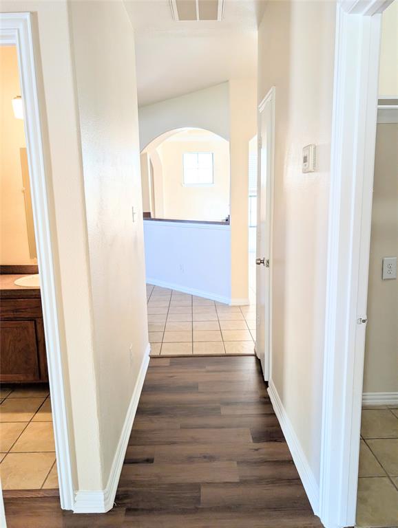 1223 Georgia Avenue Dallas, TX 75216 - Photo 5 of 13 a view of a hallway with wooden floor and entryway