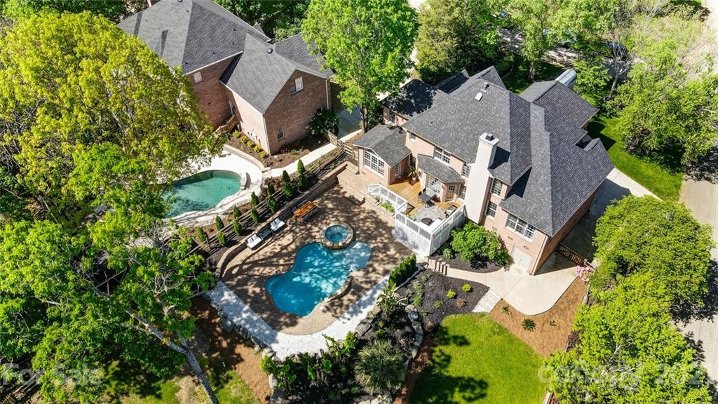 7126 Topsail Circle Tega Cay, SC 29708 - Photo 2 of 48 an aerial view of a house with outdoor space and a street view
