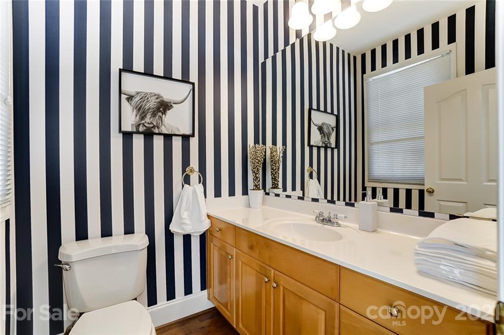 7126 Topsail Circle Tega Cay, SC 29708 - Photo 28 of 48 a bathroom with a toilet and a sink