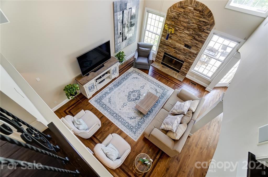 7126 Topsail Circle Tega Cay, SC 29708 - Photo 30 of 48 view of living room with furniture and flat screen tv