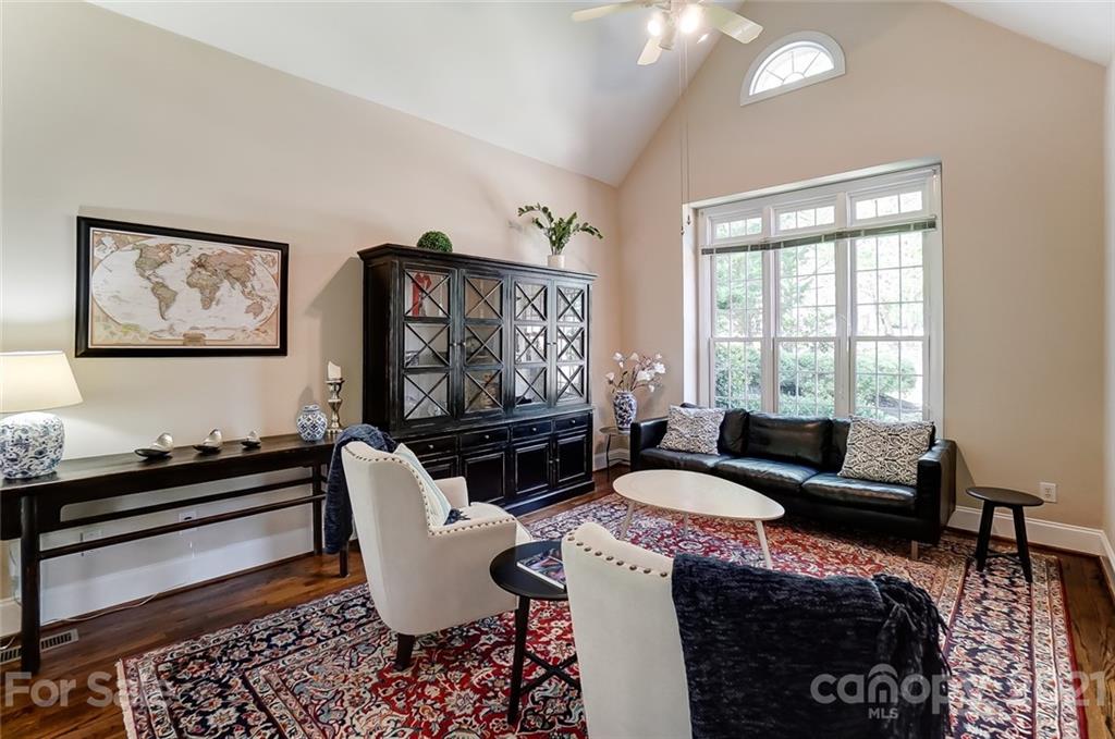 7126 Topsail Circle Tega Cay, SC 29708 - Photo 4 of 48 a living room with furniture and a floor to ceiling window