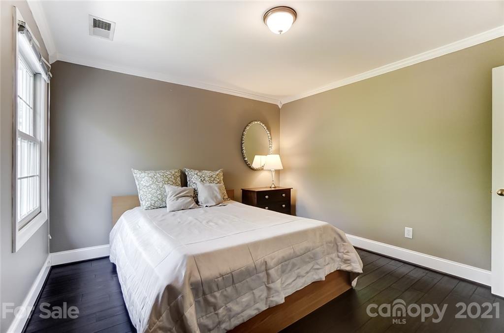 7126 Topsail Circle Tega Cay, SC 29708 - Photo 37 of 48 a bed sitting in a bedroom next to a window