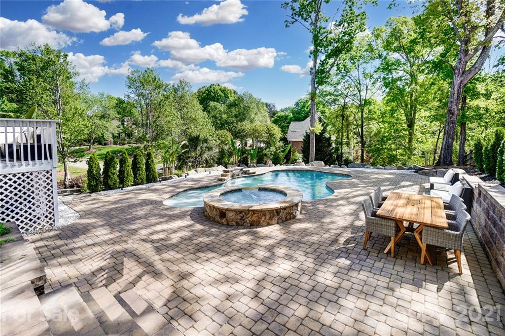 7126 Topsail Circle Tega Cay, SC 29708 - Photo 43 of 48 a view of a backyard with sitting area
