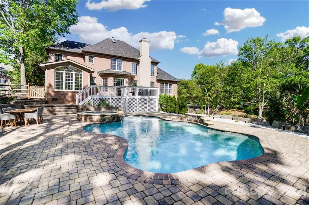 7126 Topsail Circle Tega Cay, SC 29708 - Photo 44 of 48 a view of a house with swimming pool and sitting area