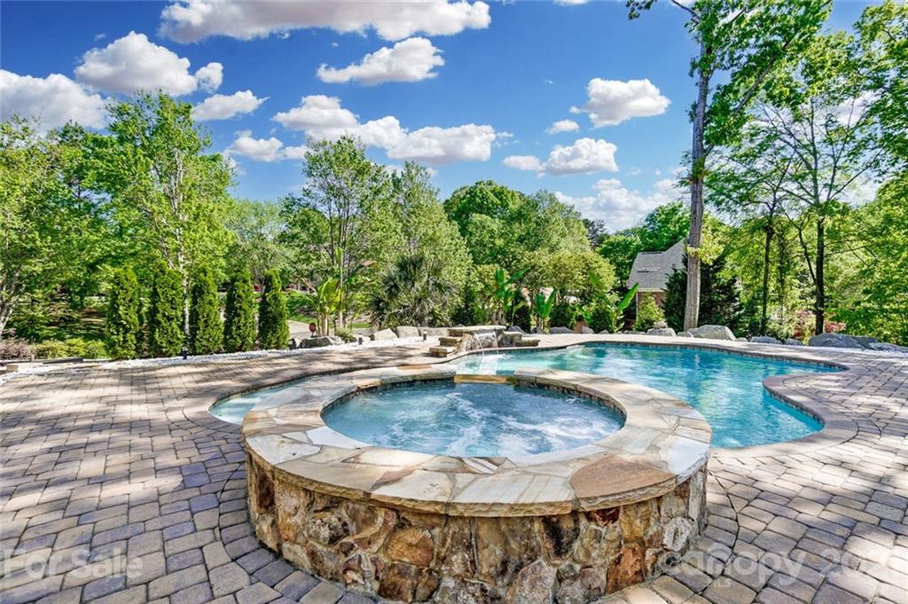 7126 Topsail Circle Tega Cay, SC 29708 - Photo 47 of 48 a view of a swimming pool with a yard