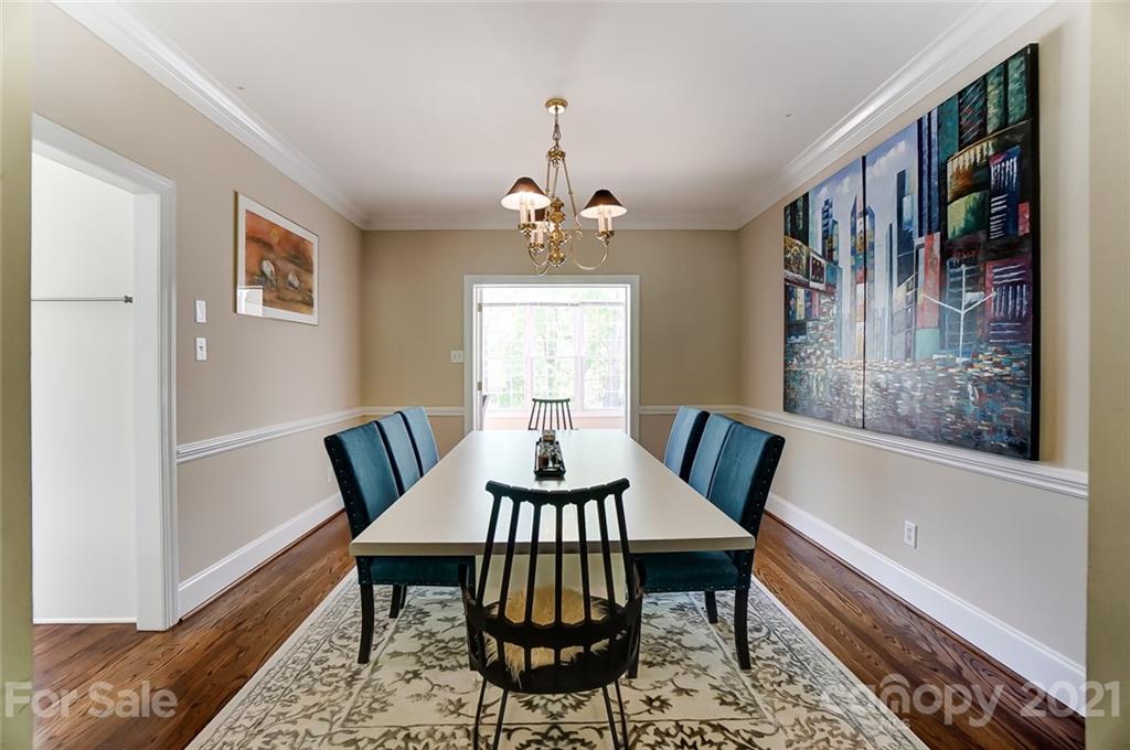7126 Topsail Circle Tega Cay, SC 29708 - Photo 8 of 48 a view of a dining room with furniture window and wooden floor