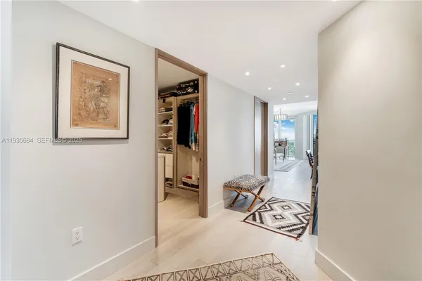 a view of a livingroom with furniture and front door