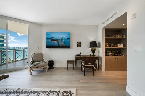 a workspace with furniture and window