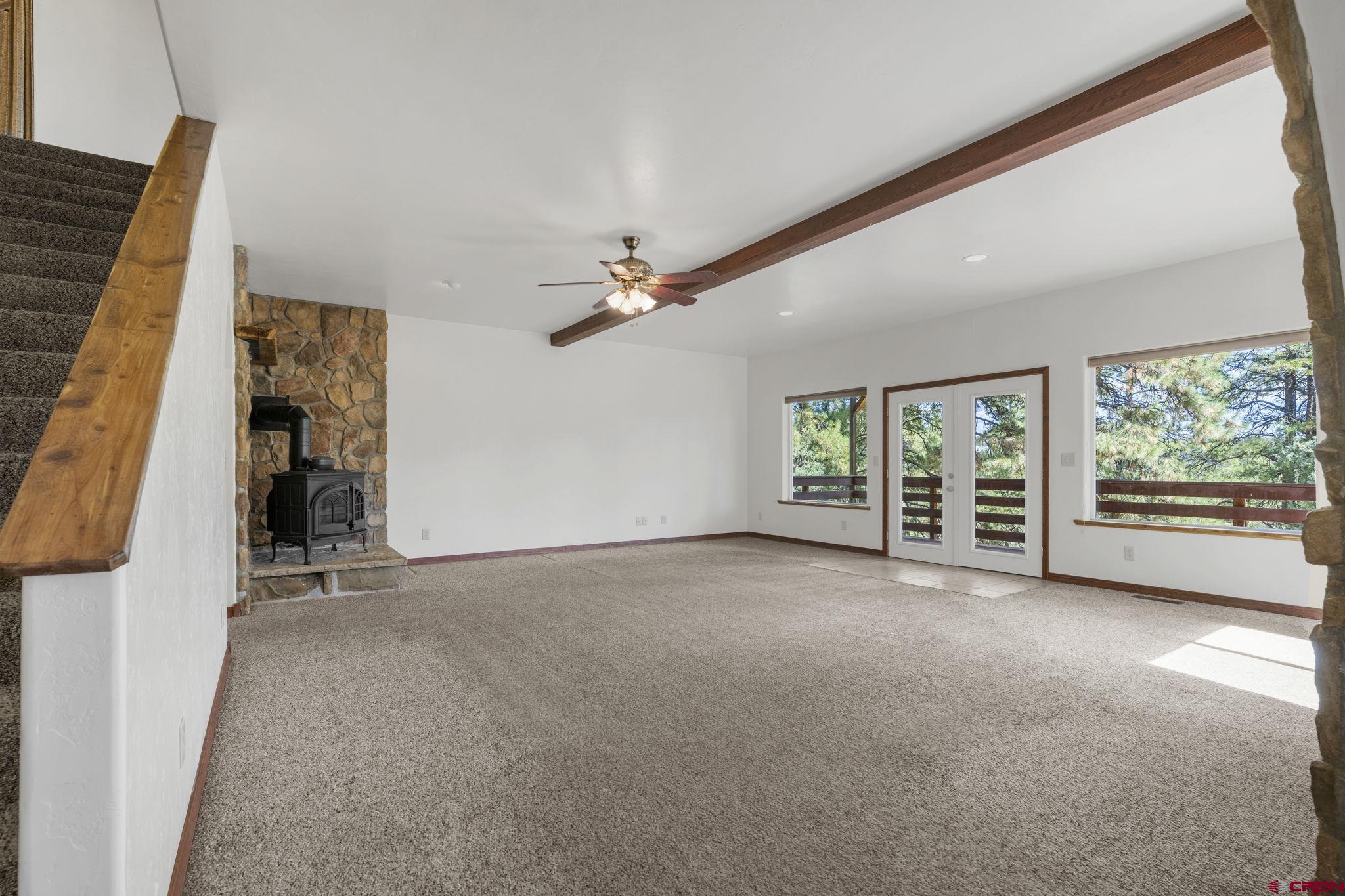 564 Spring Road Durango, CO 81303 - Photo 20 of 45 a view of empty room with floor to ceiling window