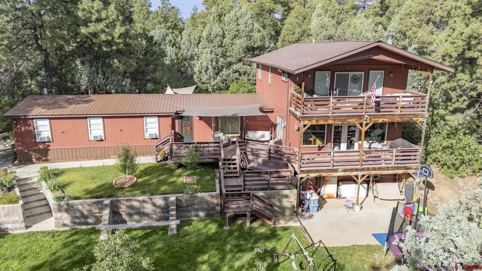 564 Spring Road Durango, CO 81303 - Photo 2 of 45 an aerial view of a house with a yard