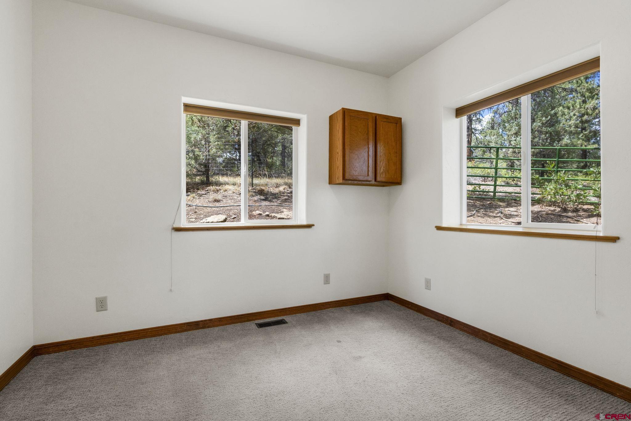 564 Spring Road Durango, CO 81303 - Photo 33 of 45 an empty room with a window