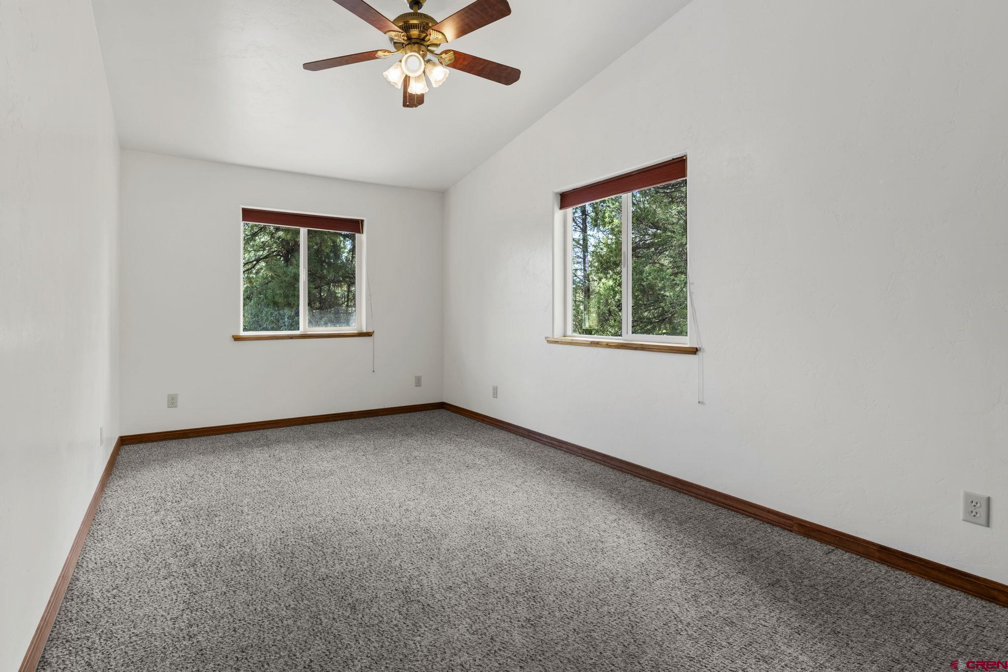 564 Spring Road Durango, CO 81303 - Photo 37 of 45 an empty room with a window