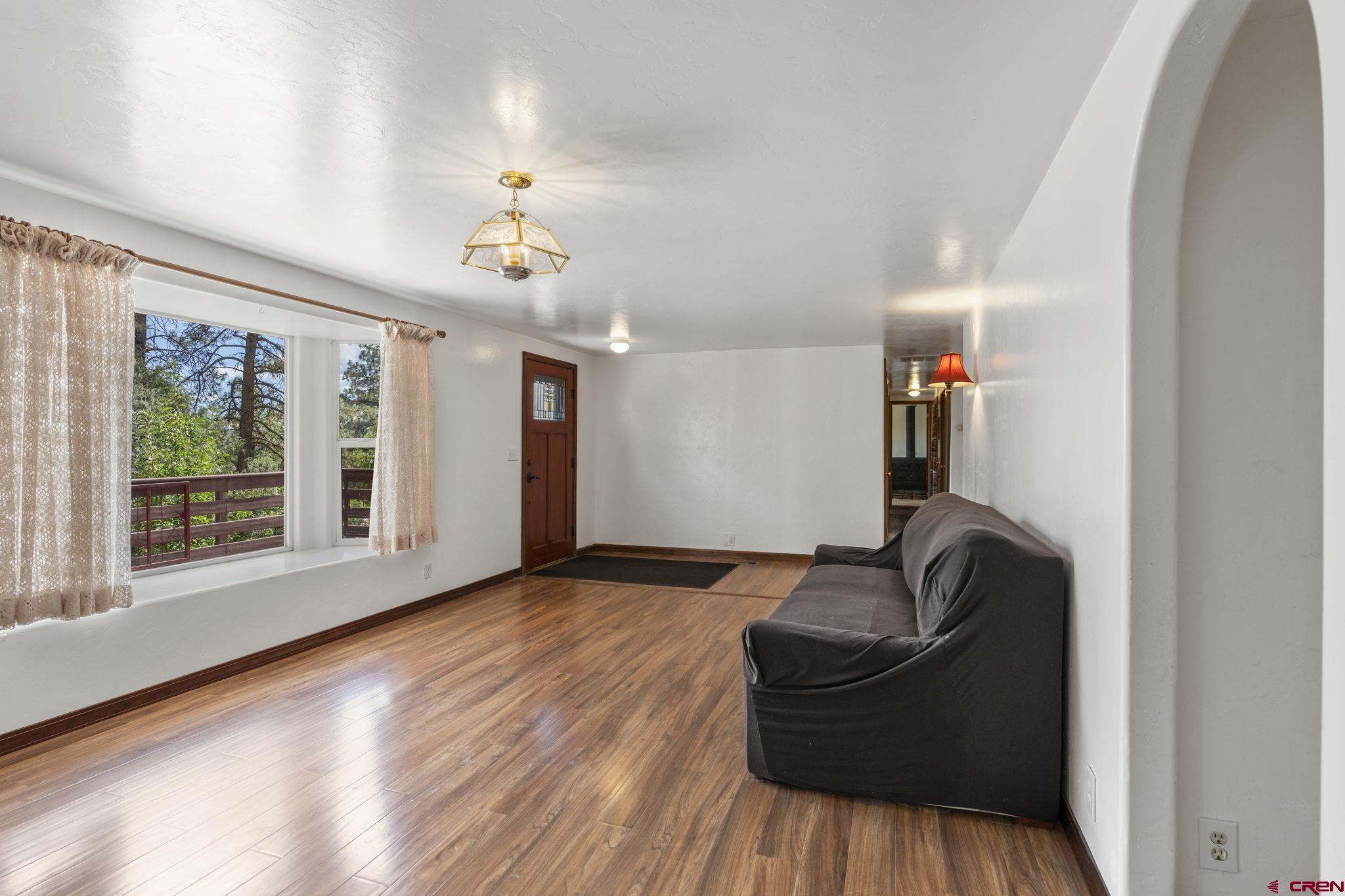 564 Spring Road Durango, CO 81303 - Photo 5 of 45 a living room with furniture and a window
