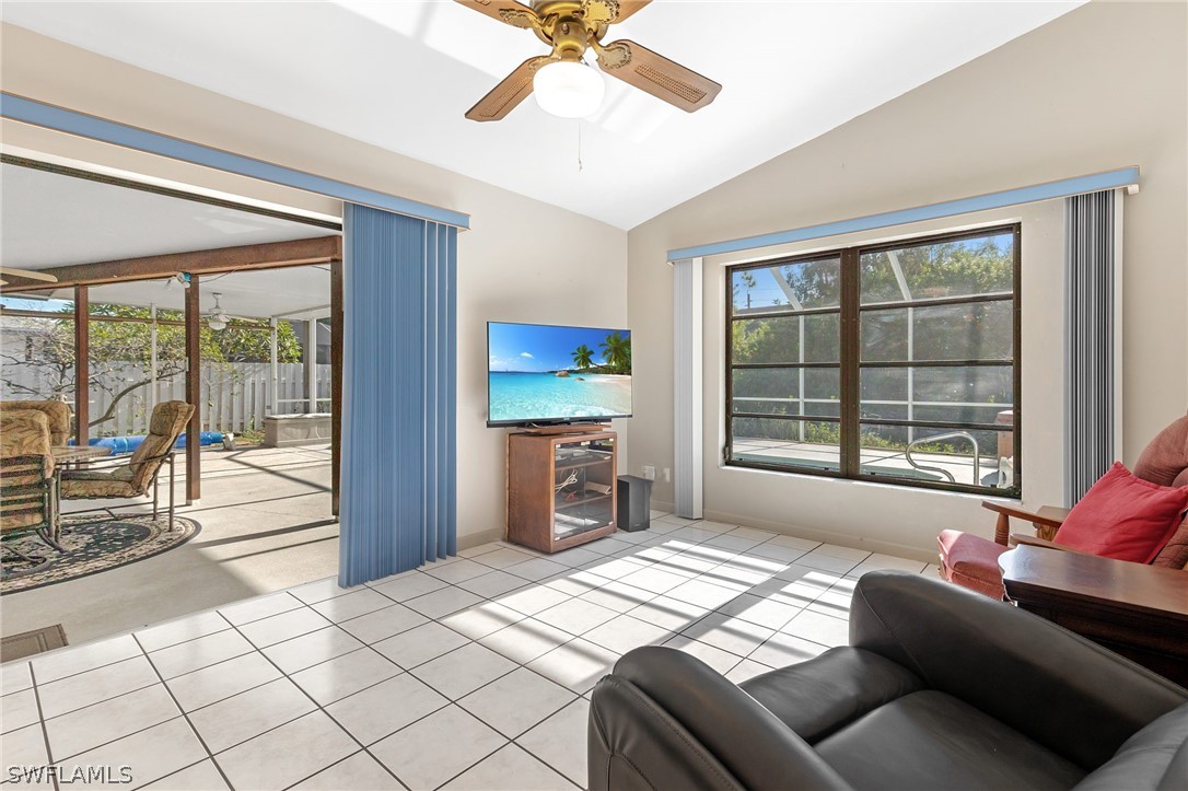 17501 Laurel Valley Road Fort Myers, FL 33967 - Photo 15 of 26 a bedroom with a bed and glass walk in closet