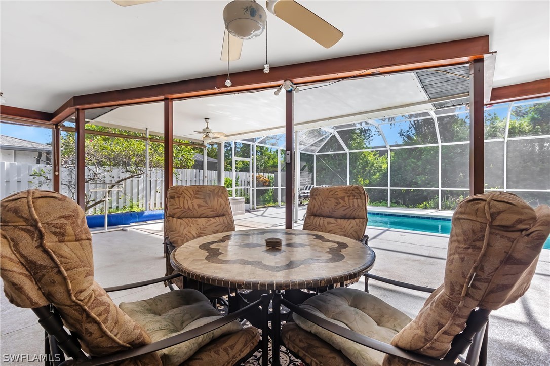 17501 Laurel Valley Road Fort Myers, FL 33967 - Photo 23 of 26 a view of a dining room with furniture window and outside view