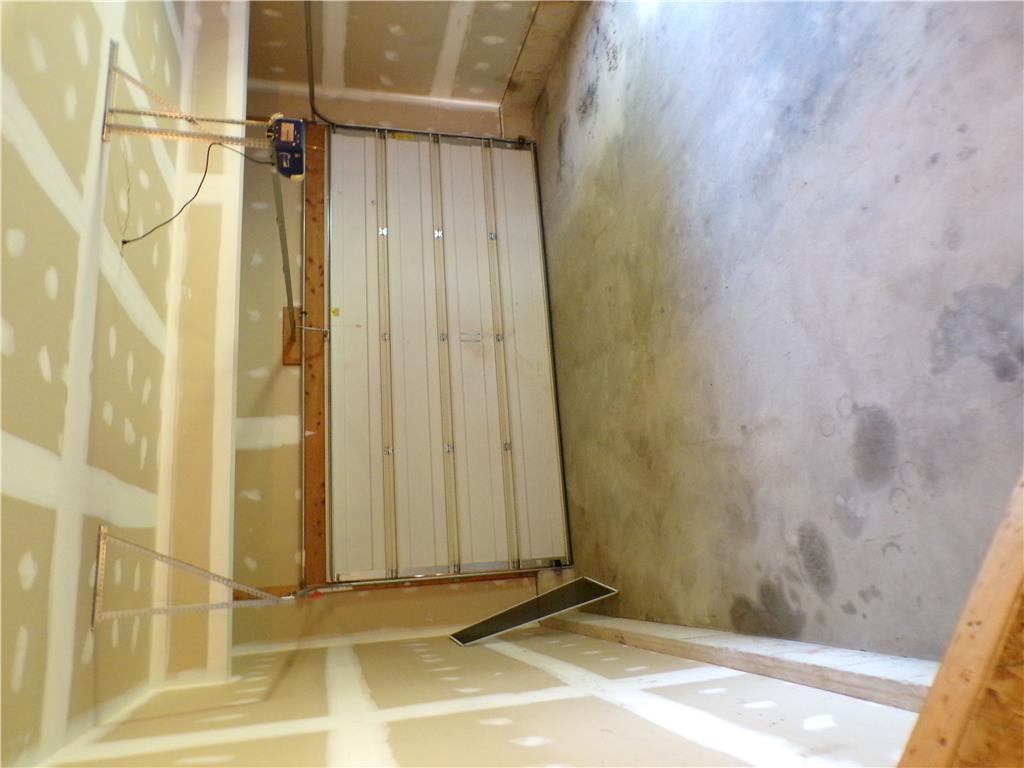 3283 Seip Road Macungie, PA 18062 - Photo 31 of 33 Functional 2 car attached garage space featuring a robust garage door opener mechanism and durable concrete flooring.