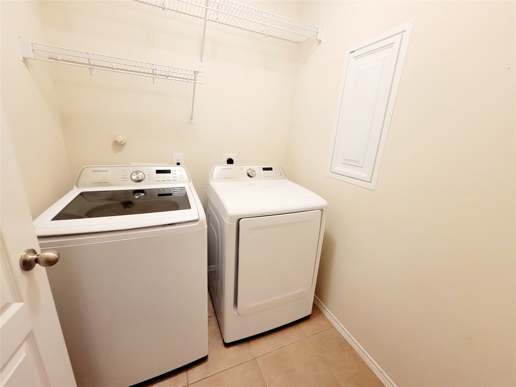 219 Golden Grain Drive Rosenberg, TX 77469 - Photo 15 of 17 a utility room with dryer and washer
