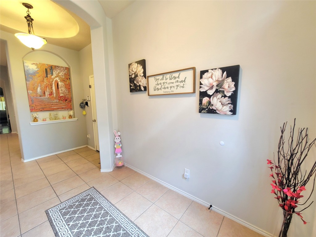 219 Golden Grain Drive Rosenberg, TX 77469 - Photo 5 of 17 a view of room with window and flower pot