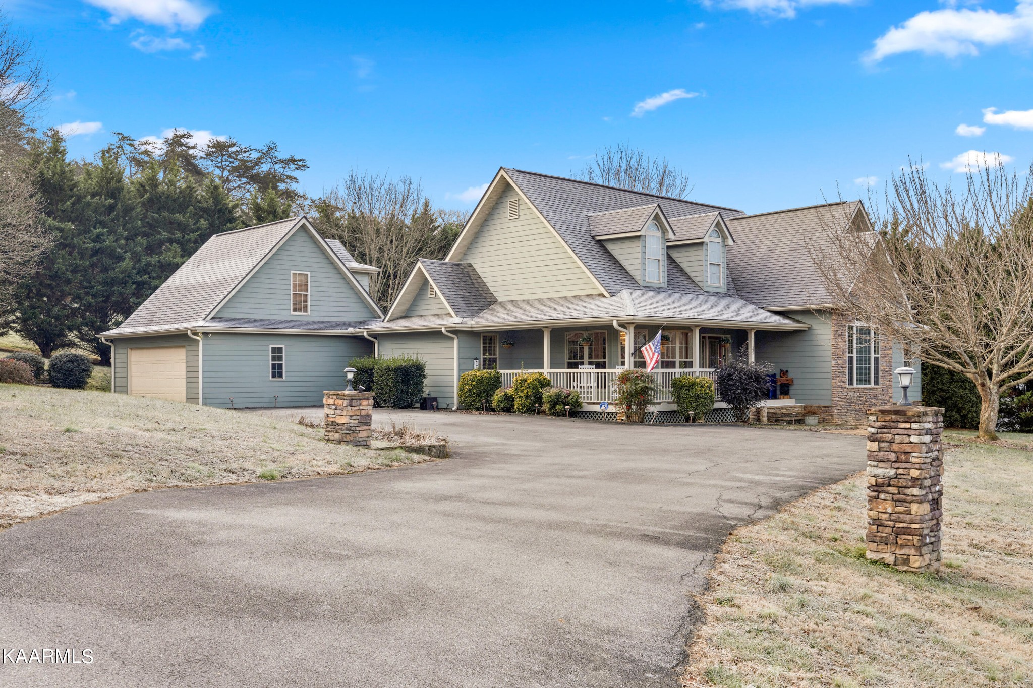 1142 Denton Road Sevierville, TN 37862 - Photo 1 of 28 a front view of a house with a yard