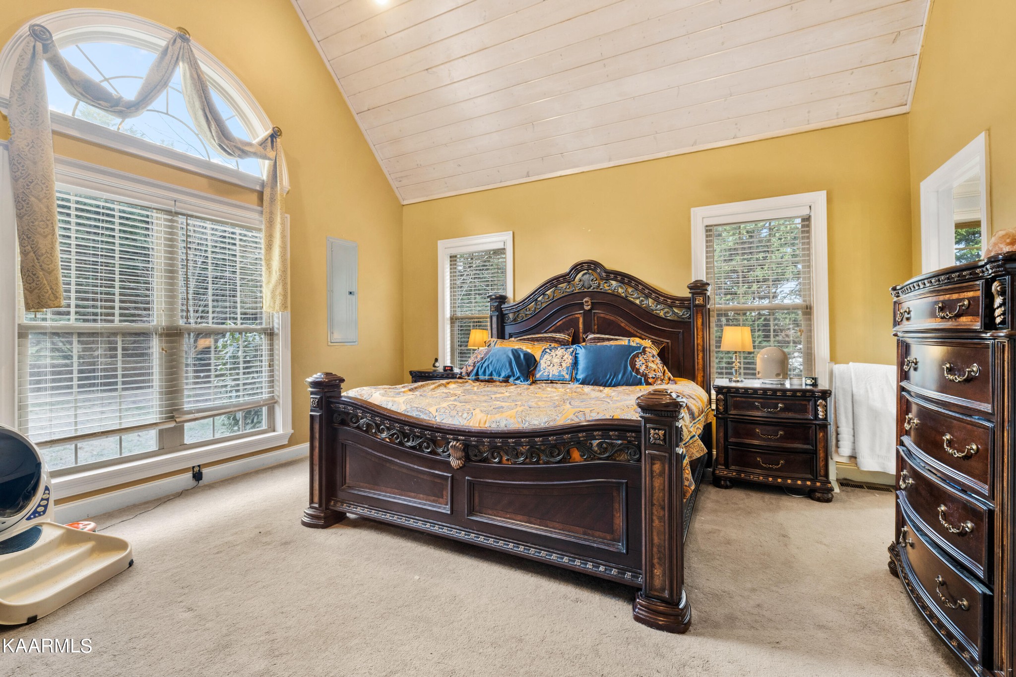 1142 Denton Road Sevierville, TN 37862 - Photo 13 of 28 a bed sitting in a room next to a window
