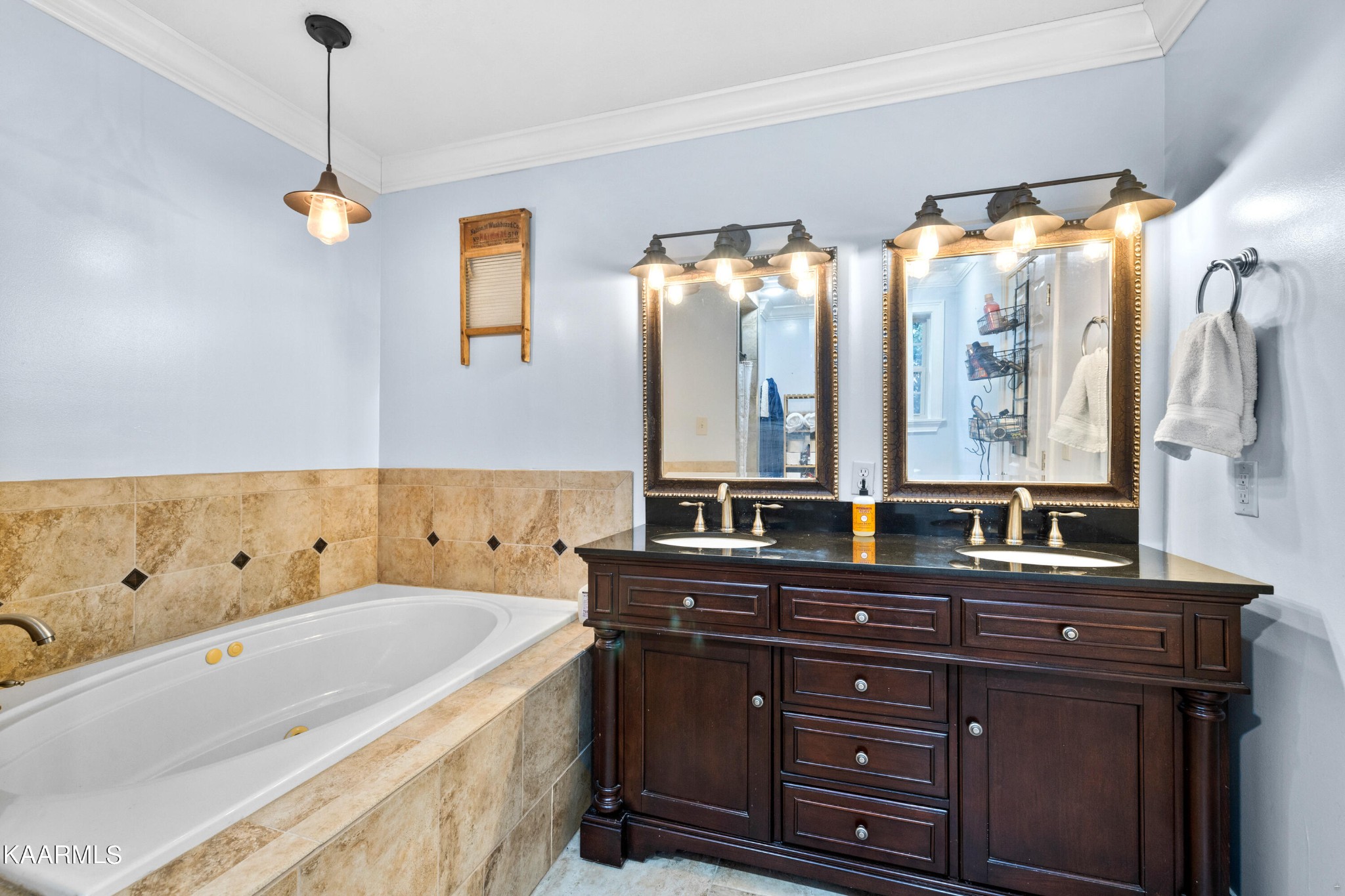 1142 Denton Road Sevierville, TN 37862 - Photo 15 of 28 a spacious bathroom with a granite countertop tub a double vanity sink and mirror