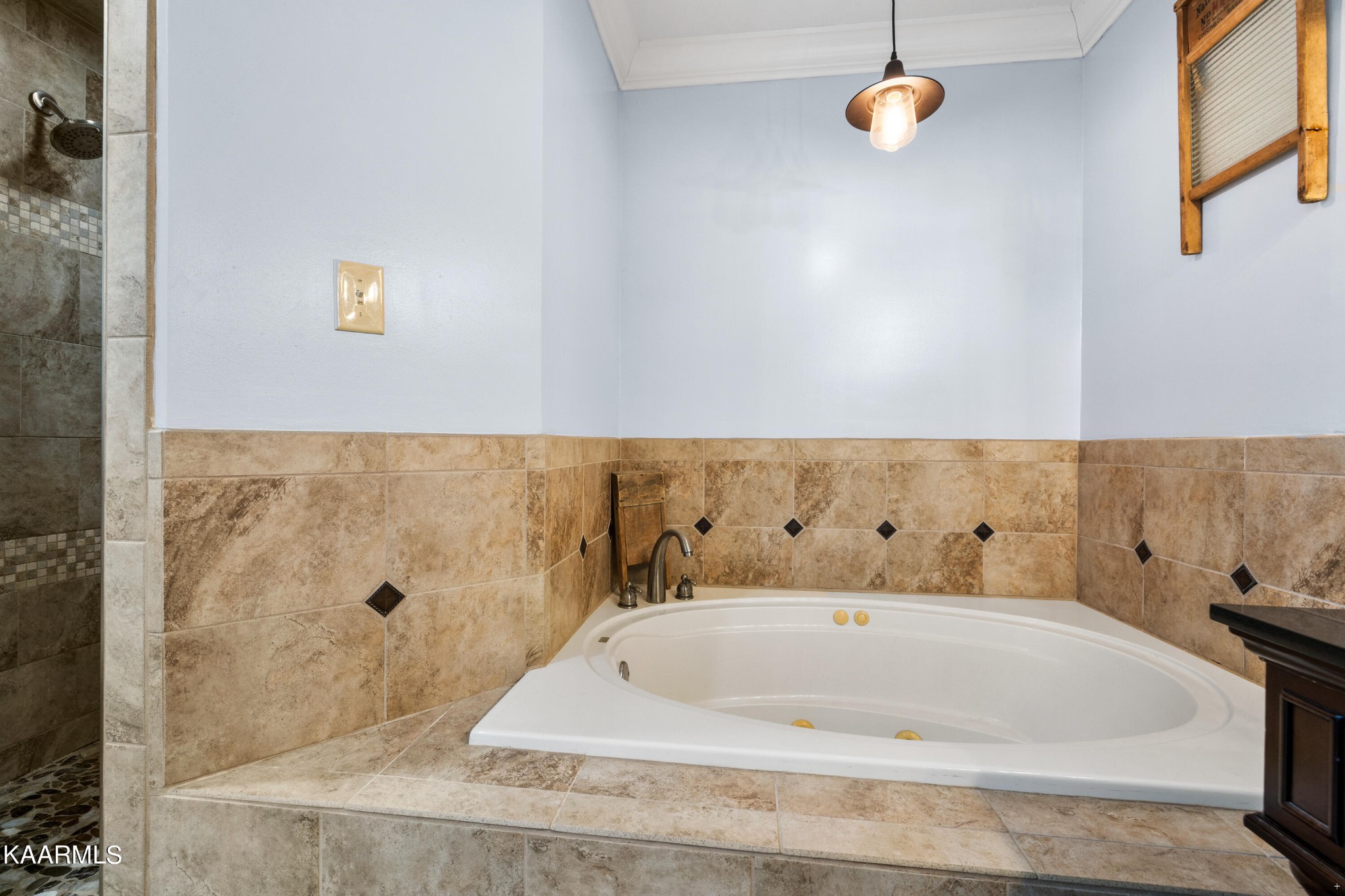 1142 Denton Road Sevierville, TN 37862 - Photo 16 of 28 a bath tub sitting next to a bathroom