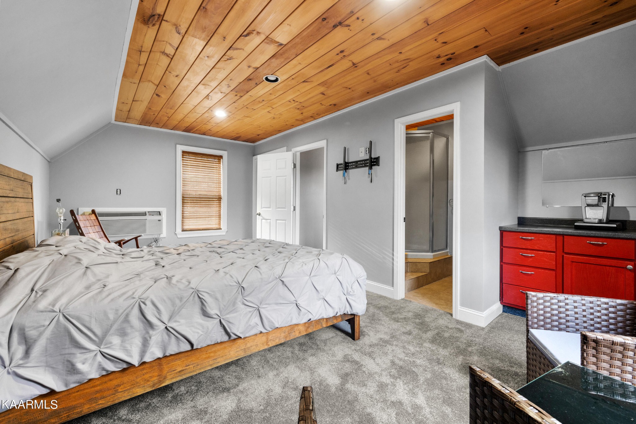 1142 Denton Road Sevierville, TN 37862 - Photo 22 of 28 a bedroom with a bed and dresser