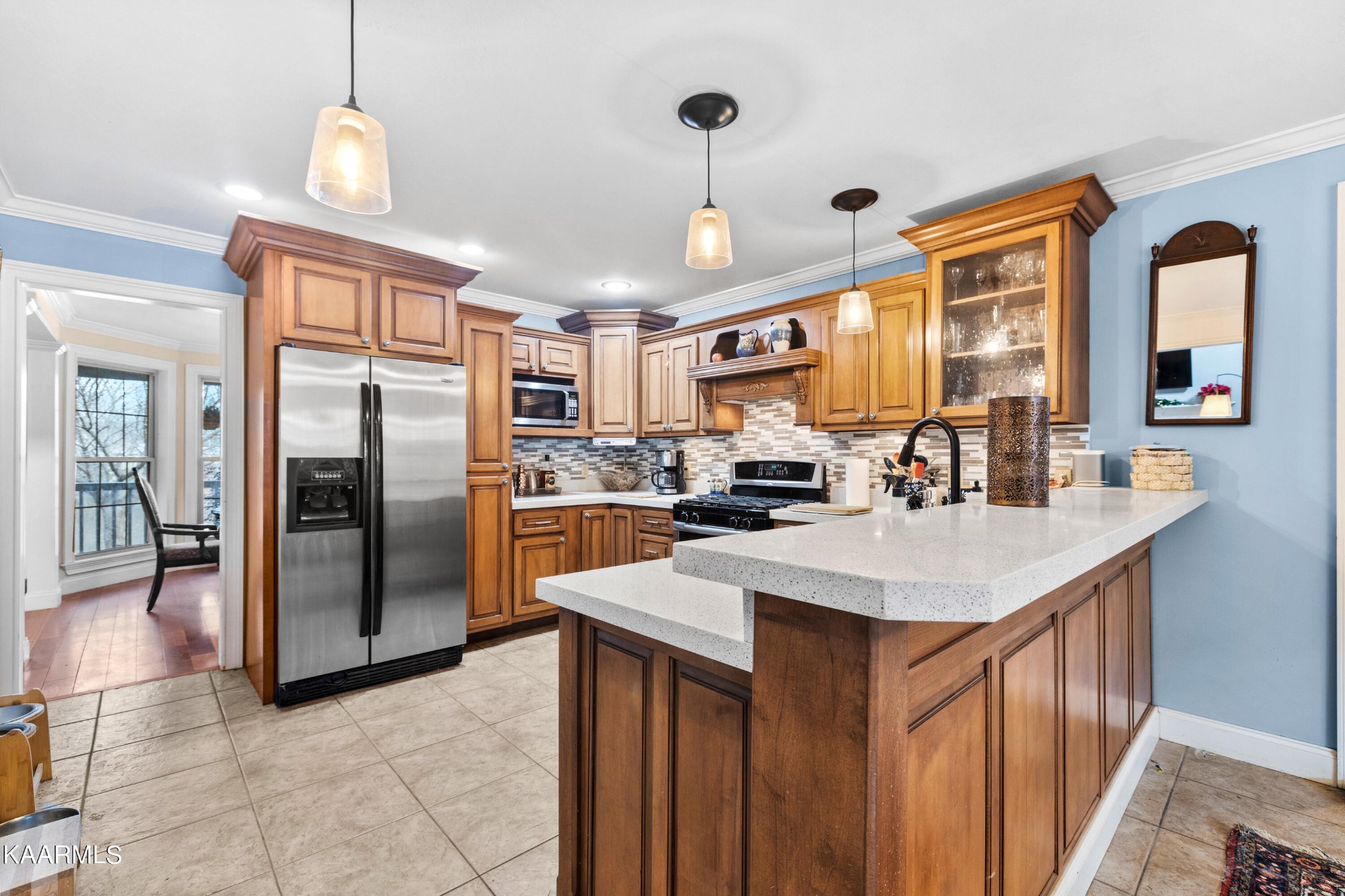 1142 Denton Road Sevierville, TN 37862 - Photo 7 of 28 a kitchen with stainless steel appliances a sink stove and refrigerator
