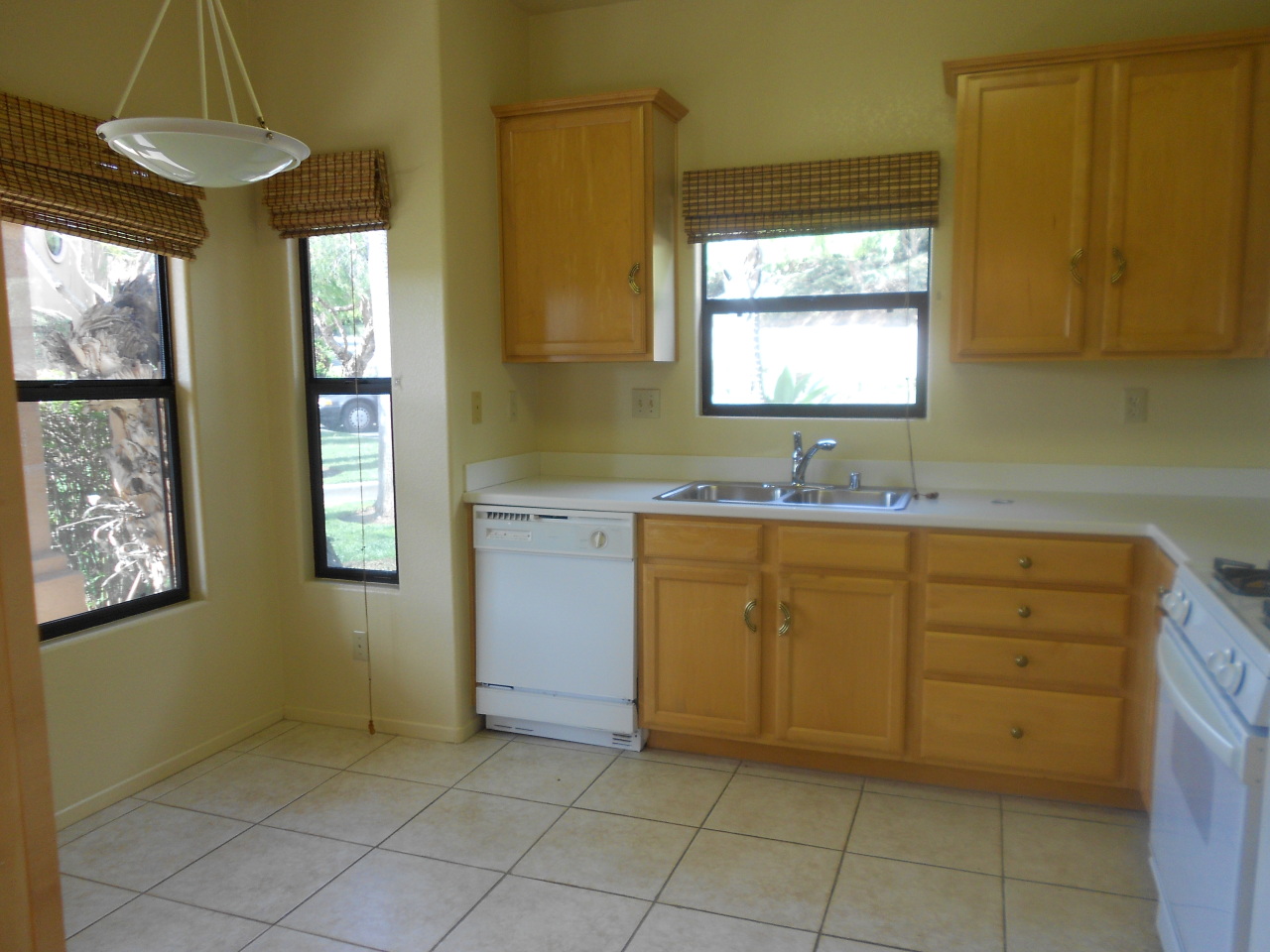 a bathroom with a sink vanity and mirror