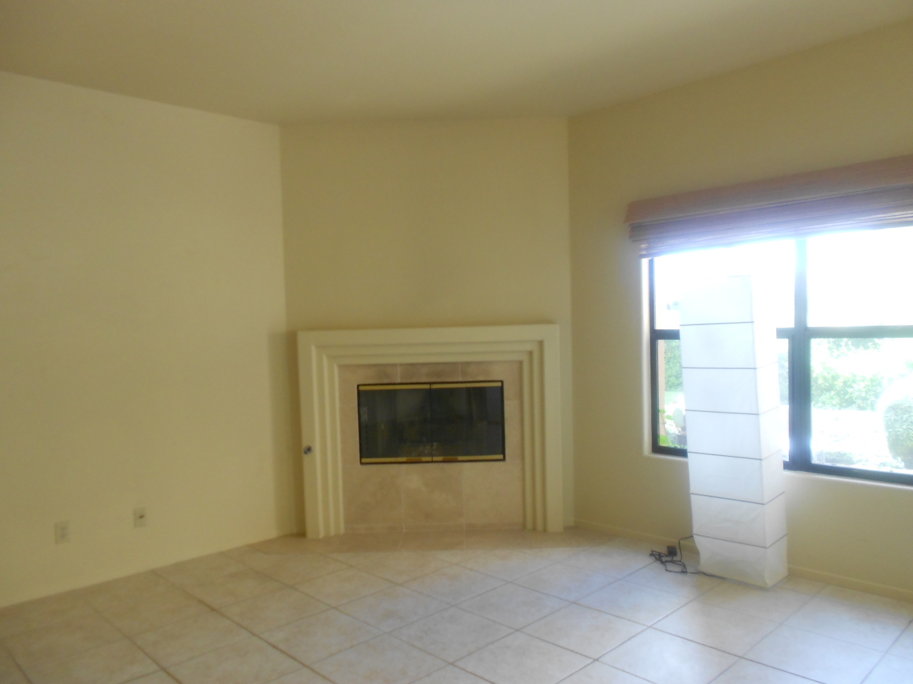 4621 Gerona Way Santa Barbara, CA 93110 - Photo 3 of 5 a view of a livingroom with a fireplace and a window