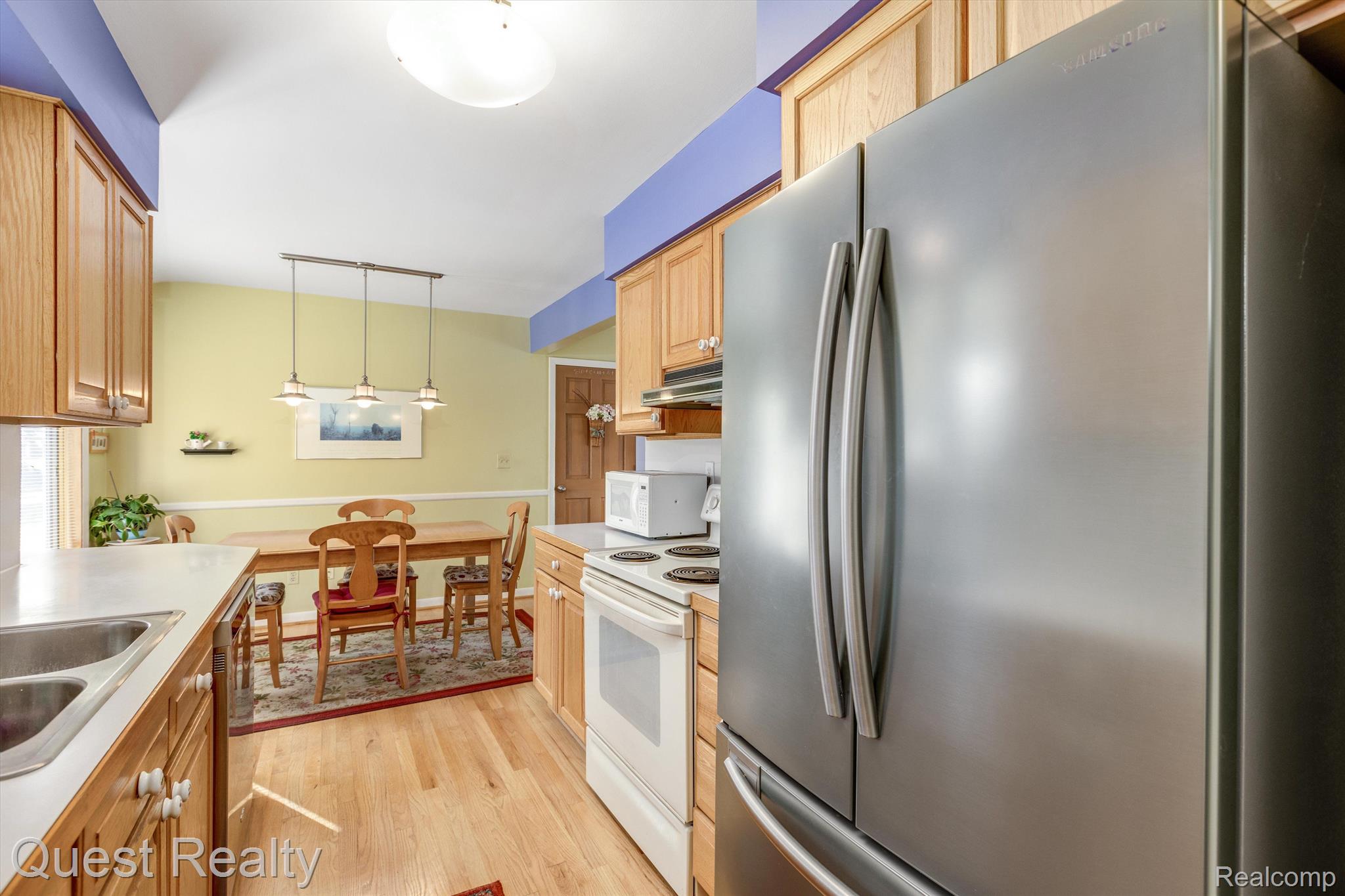 1401 Sycamore Drive Rochester, MI 48307 - Photo 8 of 45 kitchen with some stainless steel appliances