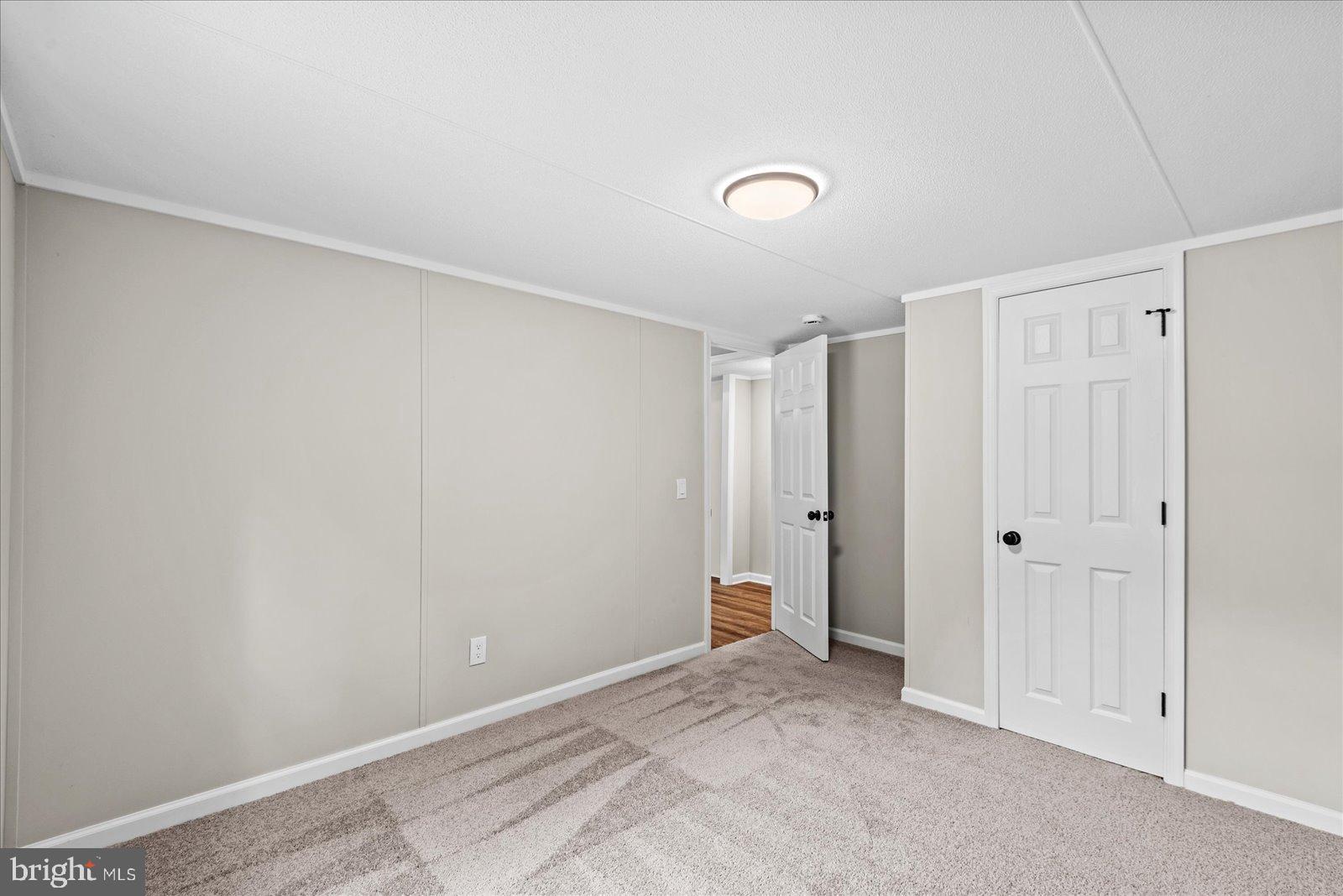 20105 Sparta Road Milford, VA 22514 - Photo 20 of 48 Spacious, versatile room with modern finishes.