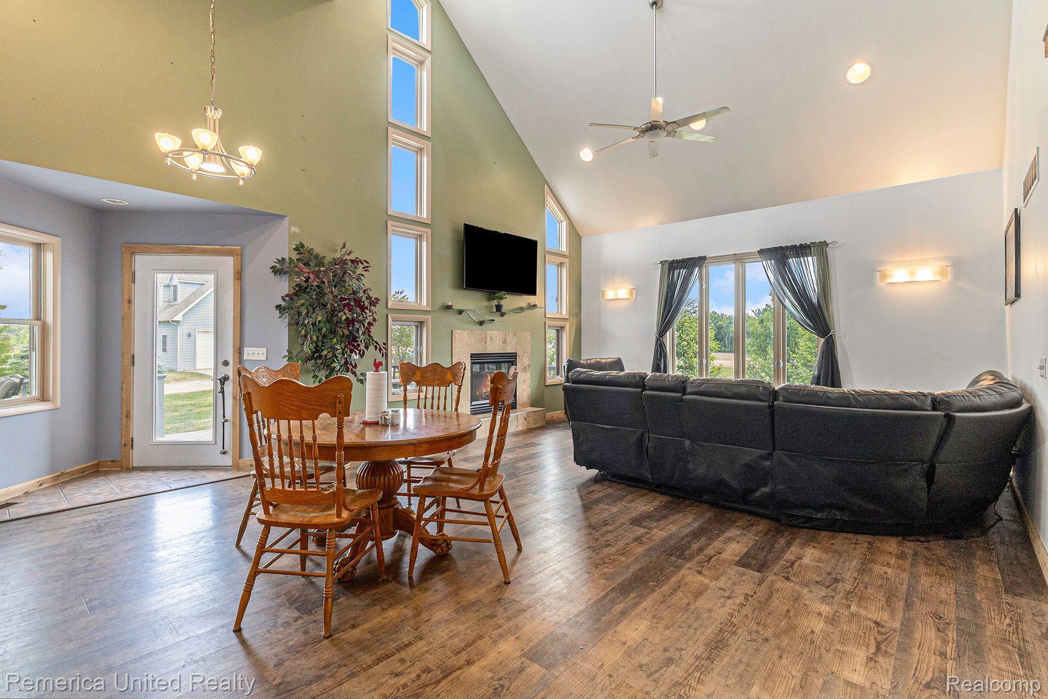 8722 North Gregory Road Fowlerville, MI 48836 - Photo 10 of 35 Dining Area, Door to Deck & Great Room