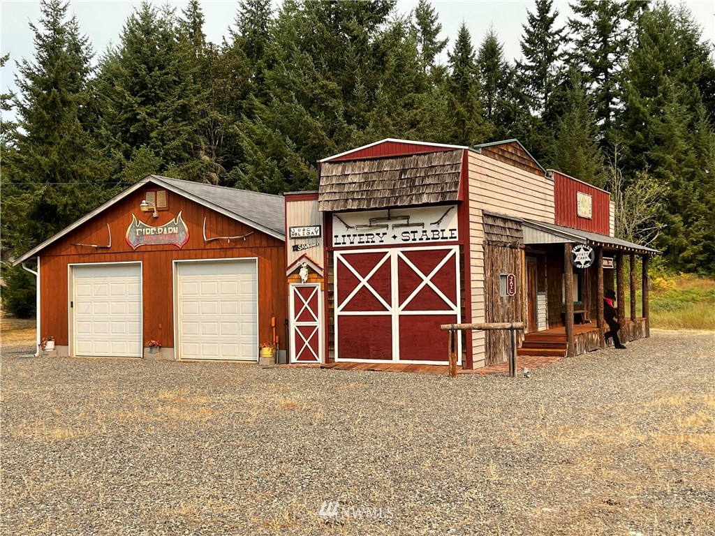 19229 Patterson Road East Orting, WA 98360 - Photo 1 of 35 a front view of a house with parking area