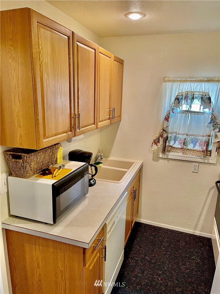 19229 Patterson Road East Orting, WA 98360 - Photo 18 of 35 a bathroom with a sink and a mirror