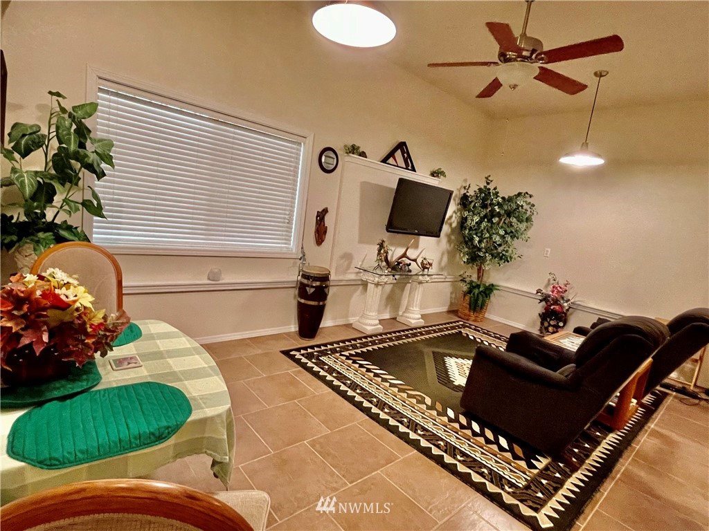 19229 Patterson Road East Orting, WA 98360 - Photo 24 of 35 a living room with furniture and a potted plant