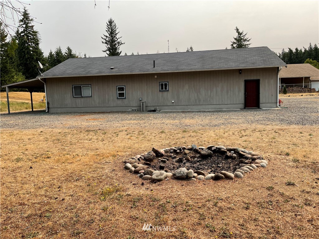 19229 Patterson Road East Orting, WA 98360 - Photo 6 of 35 a view of a house with a outdoor space