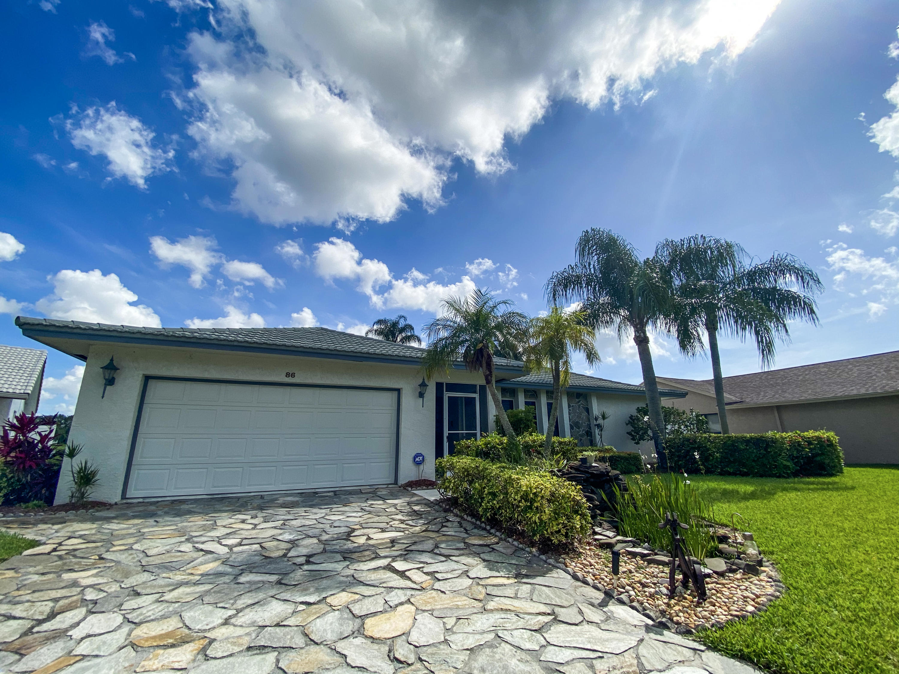 86 Las Brisas Boynton Beach, FL 33426 - Photo 2 of 37 Stone Driveway!
