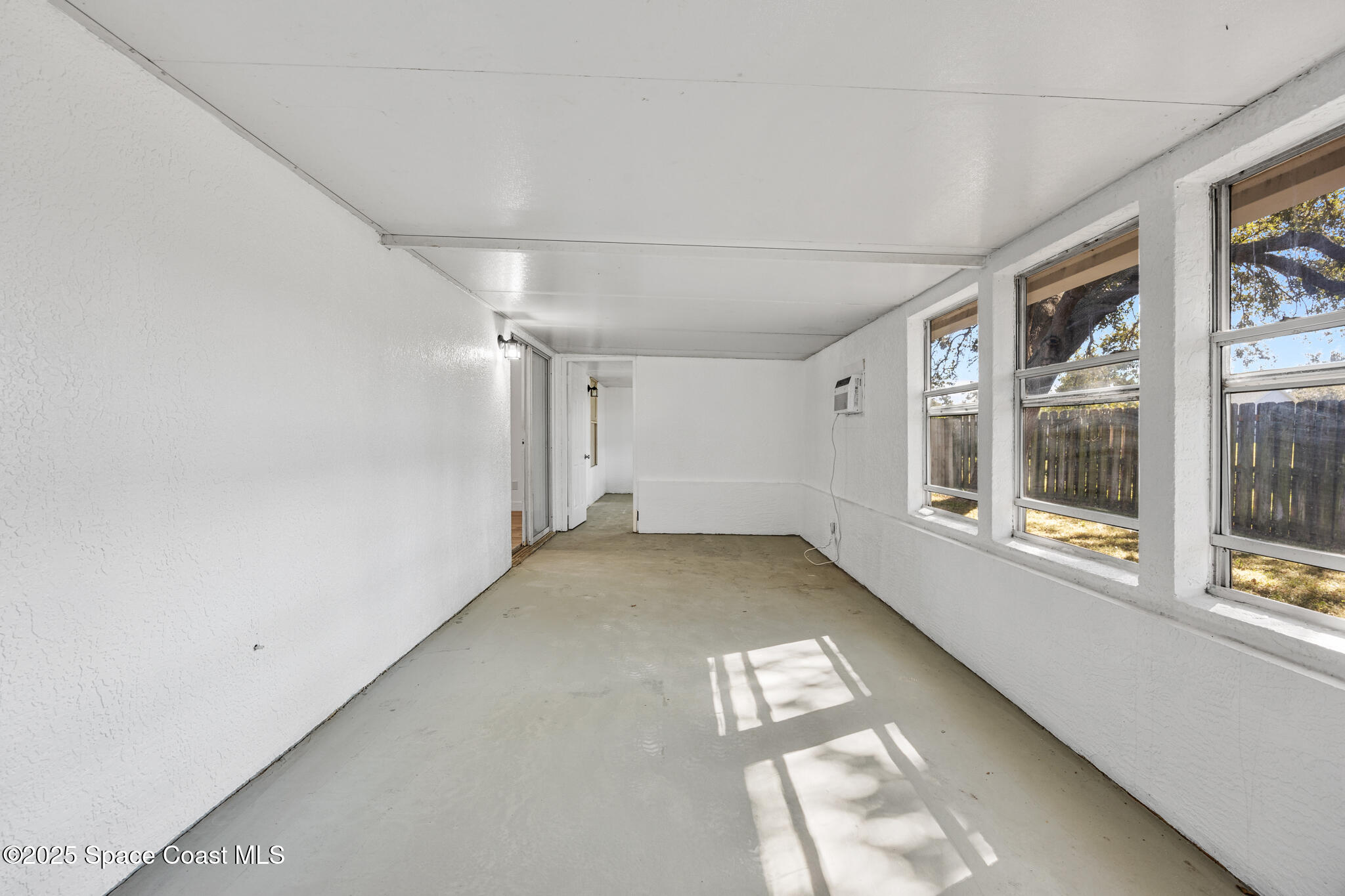 3568 Egret Drive Melbourne, FL 32901 - Photo 23 of 27 a view of empty room with windows