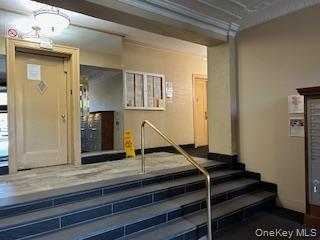 83-52 Talbot Street, Unit 3J Queens, NY 11415 - Photo 4 of 50 a view of entryway and hall with wooden floor